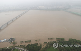 Chùm ảnh mưa ngập gây chết người ở Hàn Quốc