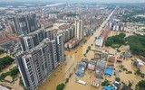 Chùm ảnh Trung Quốc ngập lụt, cảnh báo mưa bão cấp độ cao nhất ở Quảng Đông