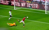 Chùm ảnh: Arsenal, Man City vui mừng trước kết quả trận Man Utd - Liverpool