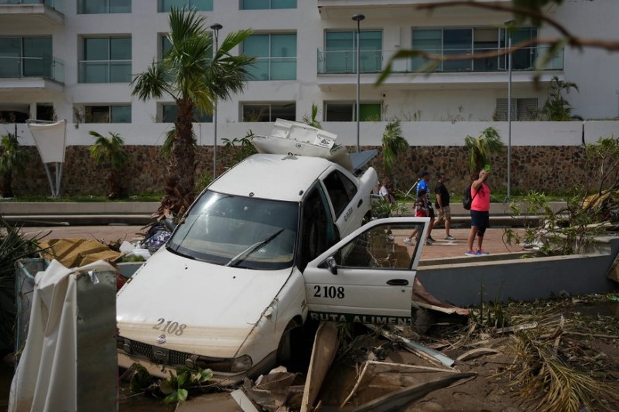 Hình ảnh bão Otis tàn phá thiên đường nghỉ mát Acapulco