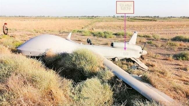 Một máy bay trinh sát không người lái của Mỹ, có số hiệu đăng ký "52178", được cho là đã bị rơi ở phía tây bắc thủ đô Baghdad của Iraq. (Ảnh: BurthaNews)