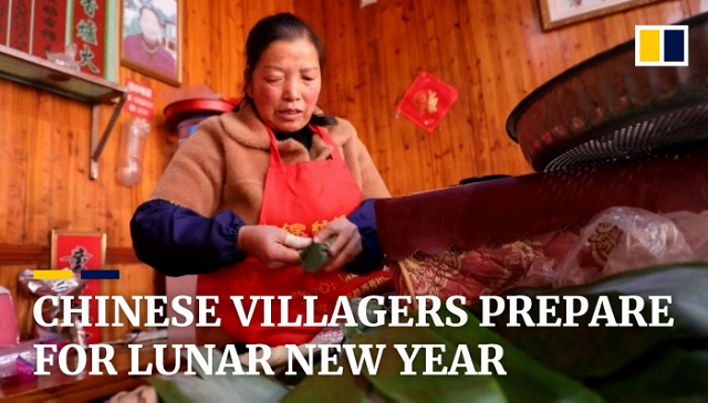 Xem người dân Trung Quốc làm bánh truyền thống, thổi sừng tre đón năm mới
