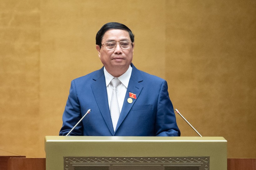 Thủ tướng Phạm Minh Chính báo cáo tại Phiên khai mạc Kỳ họp thứ VI, Quốc hội khóa XV. ảnh 1