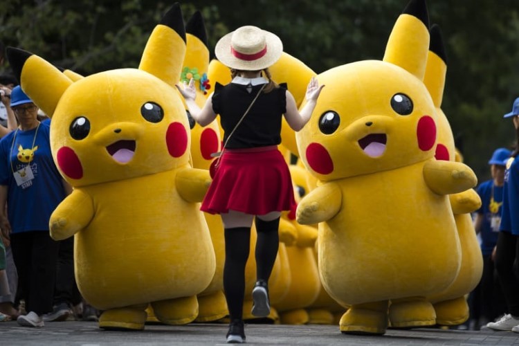 Các diễn viên hóa trang thành chuột Pikachu tại sự kiện “Pikachu Outbreak” ở thành phố Yokohama (Nhật Bản) năm 2018.