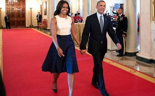 Tổng thống Mỹ Barack Obama và đệ nhất phu nhân Michelle - Ảnh: BI.
