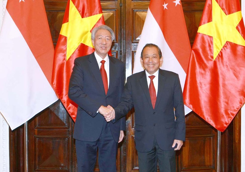 Phó Thủ tướng Trương Hoà Bình và Phó Thủ tướng Singapore Tiêu Chí Hiền - Ảnh: VGP