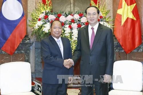 Chủ tịch nước Trần Đại Quang tiếp Trung tướng Somkeo Silavong, Bí thư Trung ương Đảng, Bộ trưởng Bộ An ninh Lào nhân dịp sang thăm chính thức Việt Nam. Ảnh: TTXVN