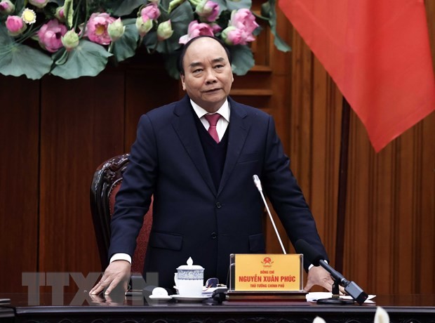 Thủ tướng Nguyễn Xuân Phúc chủ trì họp Thường trực Chính phủ về vắcxin COVID-19. (Ảnh: Thống Nhất/TTXVN)