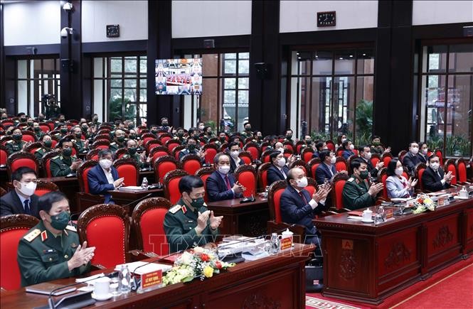 Chủ tịch nước Nguyễn Xuân Phúc dự Hội nghị Quân chính toàn quân năm 2021. Ảnh: Thống Nhất/TTXVN