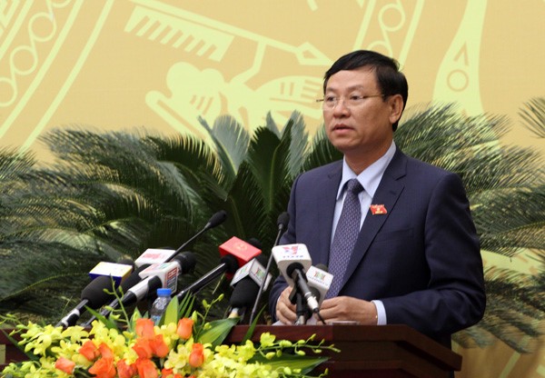 Chánh án TAND Hà Nội Nguyễn Hữu Chính trình bày báo cáo tại kỳ họp thứ 5, HĐND Hà Nội. Ảnh: Bảo Lâm.