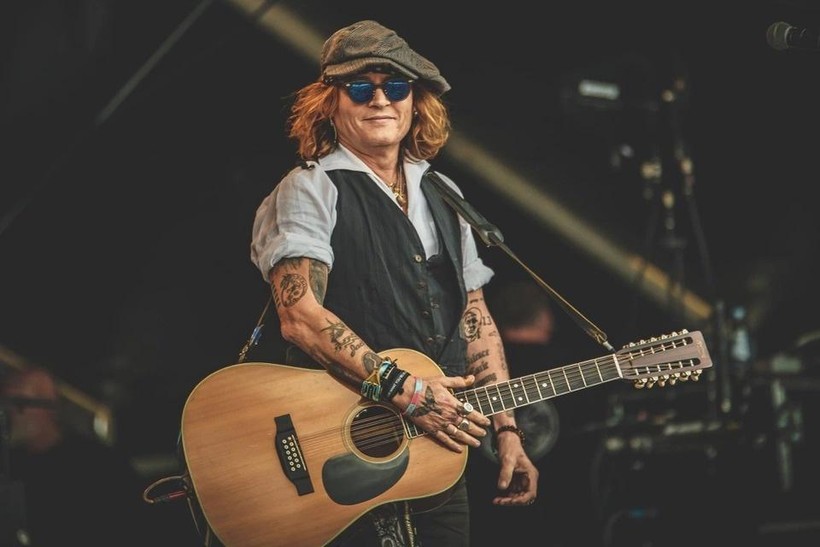 Johnny Depp is still diligently touring after winning his lawsuit. Photo: People.