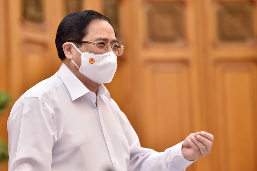 Thủ tướng Chính phủ Phạm Minh Chính chủ trì cuộc họp Thường trực Chính phủ về việc mua vắc-xin phòng COVID-19.