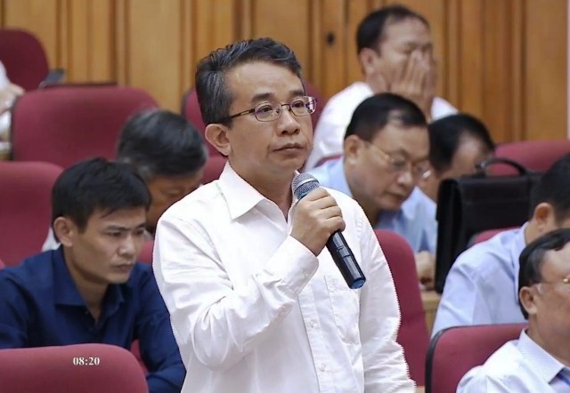 Ông Hà Văn Trọng, Giám đốc Sở Tài chính, trả lời tại phiên chất vấn HĐND tỉnh.