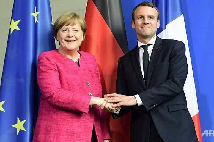 Thủ tướng Đức Angela Merkel và Tổng thống Pháp Emmanuel Macron. Ảnh: AFP.