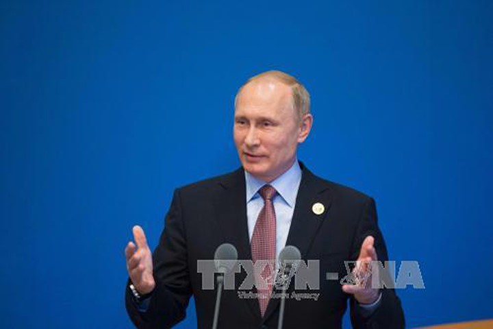 Tổng thống Nga Vladimir Putin giành được sự tin tưởng tuyệt đối của người dân Nga. Ảnh: EPA/TTXVN

