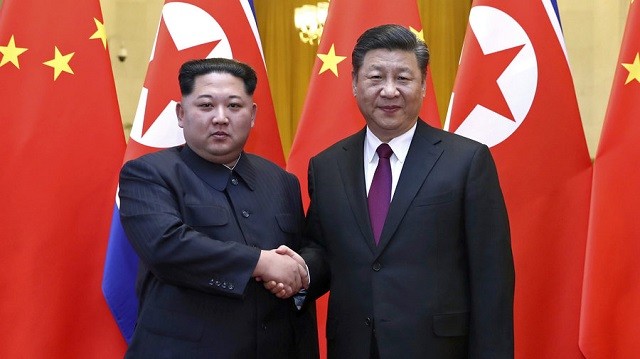 Lãnh đạo Kim Jong-un (trái) và Chủ tịch Tập Cận Bình 
