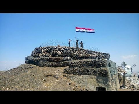 Quân đội Syria cắm cờ tại điểm cao nhất của Dara’a