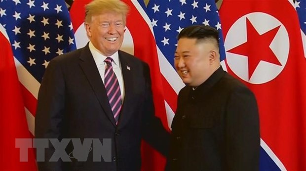 Nụ cười thoải mái, thân thiện của hai nhà lãnh đạo sau khi bắt tay nhau. (Nguồn: TTXVN)