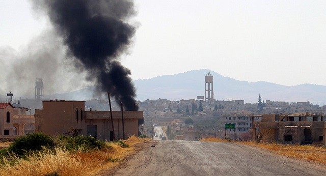 Cảnh tượng sau một cuộc giao tranh ở tỉnh Hama, Syria