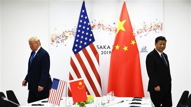 TT Mỹ Donald Trump và Chủ tịch Trung Quốc Tập Cận Bình (phải) tại Thượng đỉnh ở Osaka, Nhật Bản vào tháng 6 năm nay.