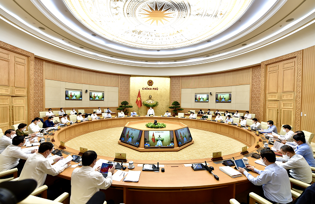 Thủ tướng Chính phủ Phạm Minh Chính chủ trì phiên họp Chính phủ thường kỳ ngày 5/5. - Ảnh: VGP/Nhật Bắc.
