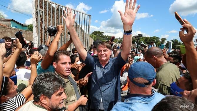 Tổng thống Brazil Jair Bolsonaro bỏ qua các quy định chống dịch tại một sự kiện ngày 21/5.