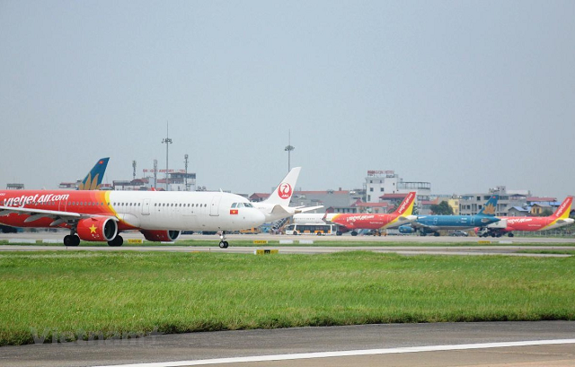 Máy bay của các hãng hàng không tại một sân bay. (Ảnh: Việt Hùng/Vietnam+).
