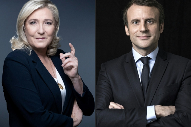 Tổng thống đương nhiệm Emmanuel Macron (phải) và lãnh đạo đảng National Rally, bà Marine Le Pen.