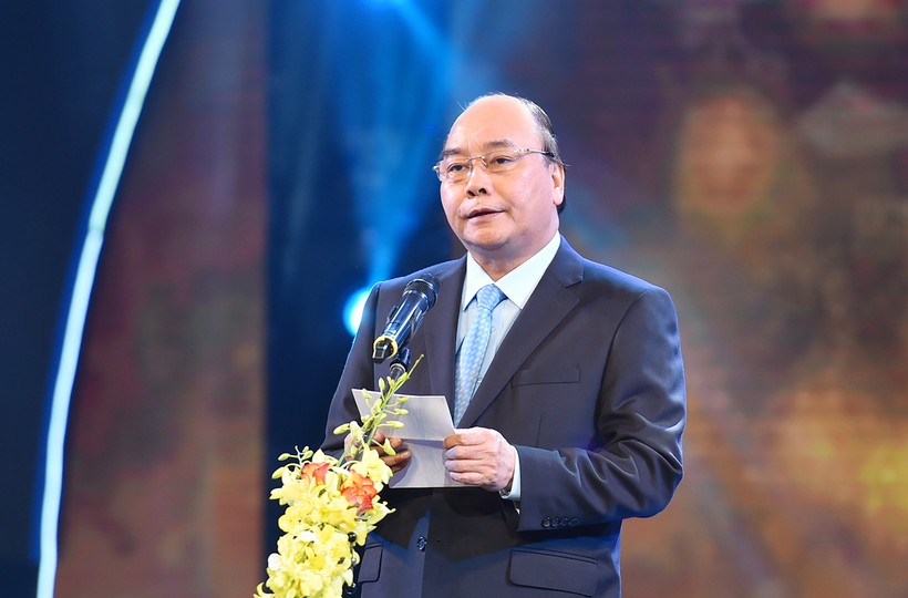 Thủ tướng Nguyễn Xuân Phúc phát biểu tại lễ kỷ niệm Ngày Bảo hiểm y tế Việt Nam. Ảnh: VGP
