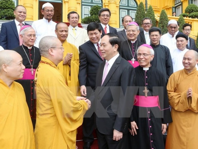Chủ tịch nước Trần Đại Quang với các đại biểu. (Ảnh: TTXVN).