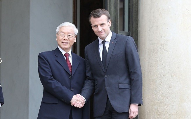 Tổng Bí thư Nguyễn Phú Trọng và Tổng thống Pháp Emmanuel Macron. Ảnh: TTXVN