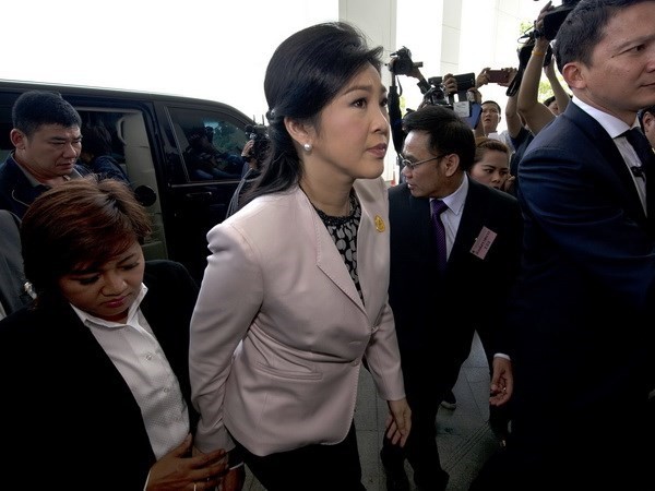 Thủ tướng tạm quyền Yingluck Shinawatra tới Ủy ban chống tham nhũng quốc gia. 