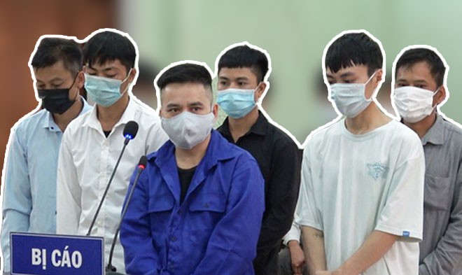 Nhóm đối tượng có hành vi tổ chức đưa 54 người Việt Nam xuất cảnh trái phép sang Trung Quốc tại phiên toà xét xử. Ảnh: Bảo Nam.