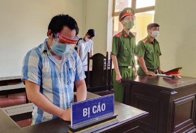 Bị cáo Nguyễn Quang Duy tại phiên tòa xét xử. Ảnh: Công an Bình Phước.