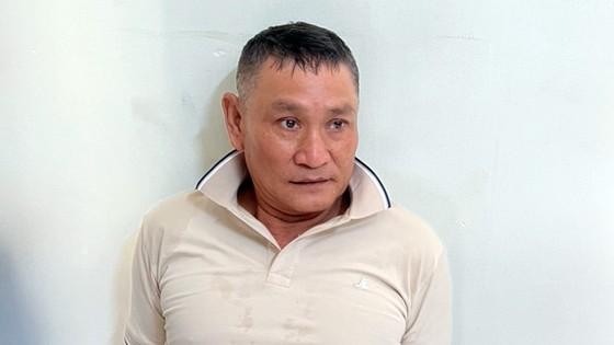 Đinh Viết Dũng bị bắt giữ sau gần nửa tháng trốn trại. Ảnh: Nguyễn Tiến.
