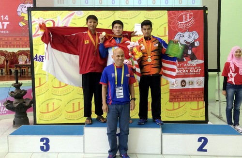 Nguyễn Minh Nhựt đã rất nỗ lực khi giành chiến thắng áp đảo trước vận động viên đội chủ nhà và giành HCV ở hạng cân 65kg