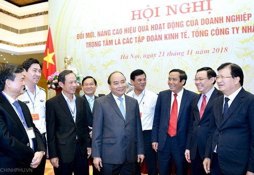Thủ tướng Nguyễn Xuân Phúc, Phó Thủ tướng Vương Đình Huệ, Phó Thủ tướng Trịnh Đình Dũng cùng các đại biểu dự Hội nghị