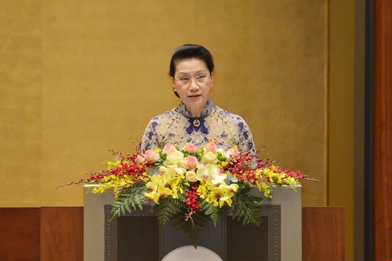 Chủ tịch Quốc hội Nguyễn Thị Kim Ngân báo cáo về công tác nhiệm kỳ Khóa XIV của Quốc hội tại Phiên khai mạc - sáng 24/3.