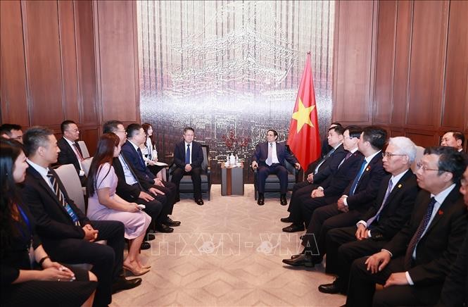 Thủ tướng Phạm Minh Chính tiếp lãnh đạo một số Tập đoàn, doanh nghiệp hàng đầu Trung Quốc. Ảnh: Dương Giang/TTXVN