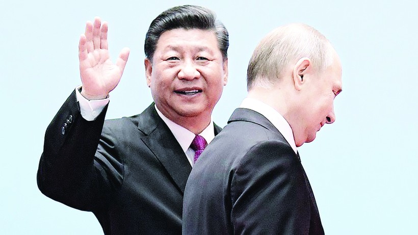 Chủ tịch Trung Quốc Tập Cận Bình và Tổng thống Nga V.Putin. 	Ảnh: Kommersant