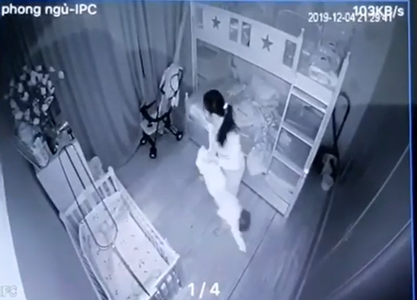 Hình ảnh bà Nguyễn Thị Doan có hành vi bạo lực với cháu bé Hoàng Tường T.A (cắt từ clip).