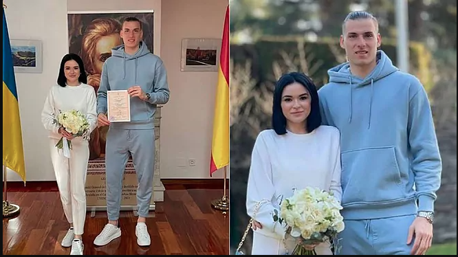 Thủ thành của Real Madrid trong trang phục thể thao đứng bên cạnh cô dâu.