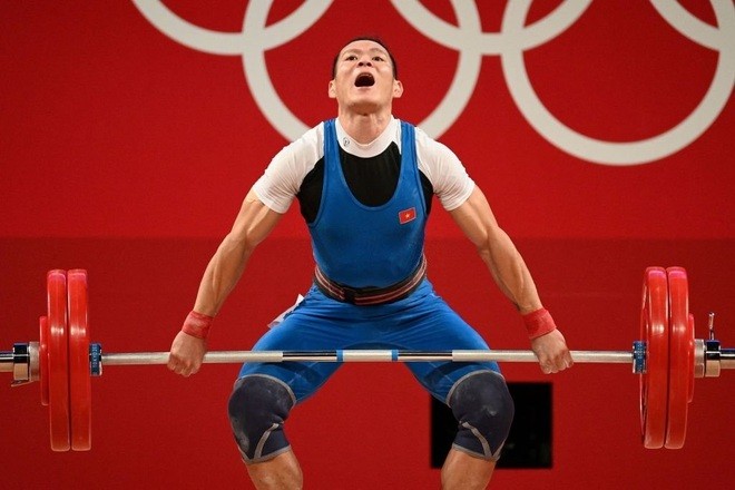 Thạch Kim Tuấn chỉ nâng mức tạ 126 kg ở nội dung cử giật.