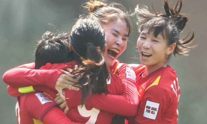Cầu thủ Việt Nam mừng chiến thắng làm nên lịch sử trước Đài Loan chiều 6/2.
