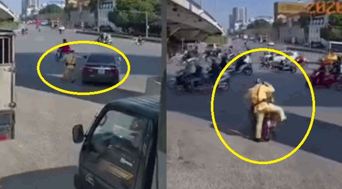 Video: Chiến sĩ CSGT nhảy lên xe ôm nhờ đuổi theo ô tô vi phạm bỏ chạy