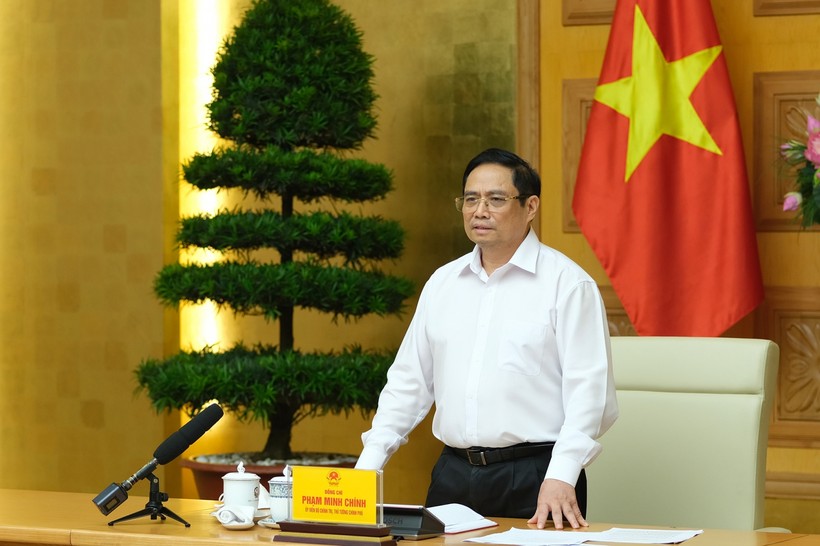Thủ tướng Phạm Minh Chính phát biểu tại cuộc làm việc với các nhà khoa học, các đơn vị, doanh nghiệp tham gia nghiên cứu, sản xuất vaccine phòng chống COVID-19 tại Việt Nam. Ảnh: VGP/Quang Hiếu.