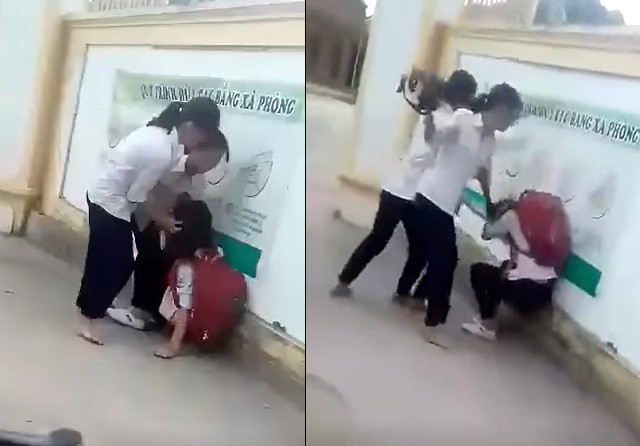 Nhóm nữ sinh Trường THCS Hội Sơn (Anh Sơn, Nghệ An) đánh bạn bị kỷ luật cảnh cáo. Ảnh cắt  từ clip.