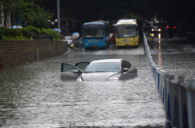 Cảnh ngập lụt tại thành phố Liuzhou, khu tự trị dân tộc Choang Quảng Tây, Trung Quốc. Nguồn: THX/TTXVN