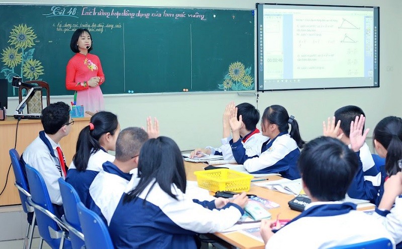 Hoạt động dạy học của cô trò Trường THCS Ái Mộ, Long Biên, Hà Nội. Ảnh: NTCC