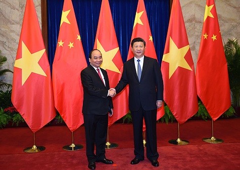 Thủ tướng Chính phủ Nguyễn Xuân Phúc hội kiến với Tổng Bí thư Đảng Cộng sản Trung Quốc, Chủ tịch nước Cộng hòa nhân dân Trung Hoa Tập Cận Bình. Ảnh: VGP